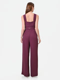 Tuta bordeaux con maxi fiocco al collo