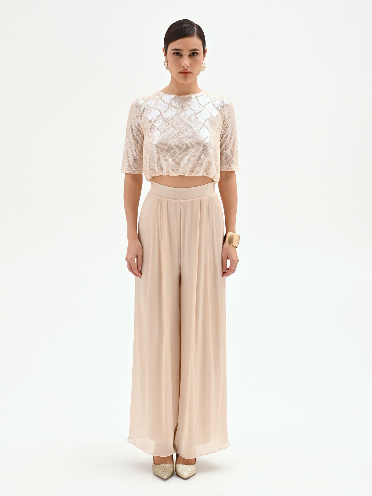 Crop top beige chiaro con paillettes
