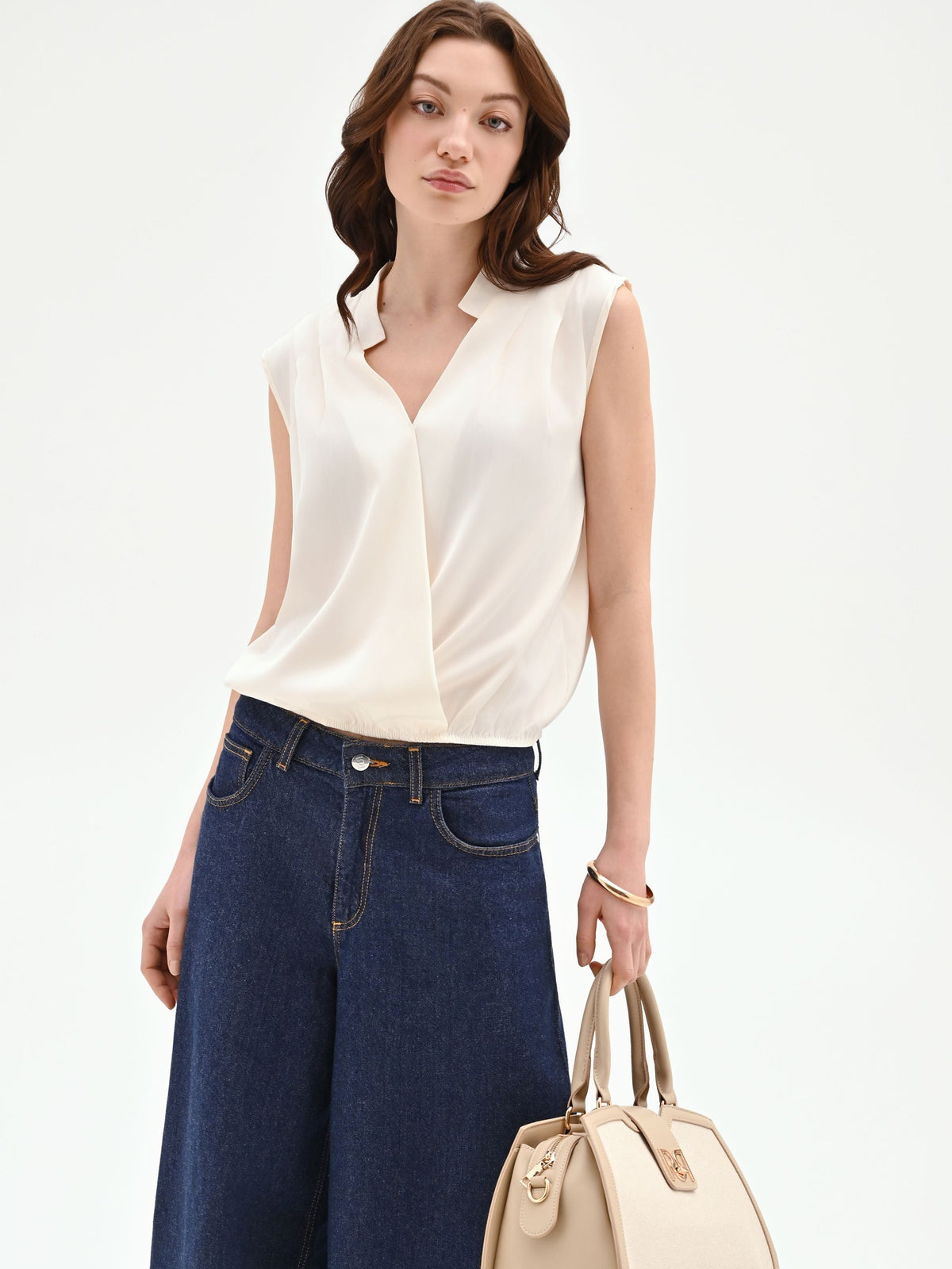 Top panna bianco in tweed stile gilet