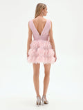 Abito corto rosa pastello con gonna in tulle