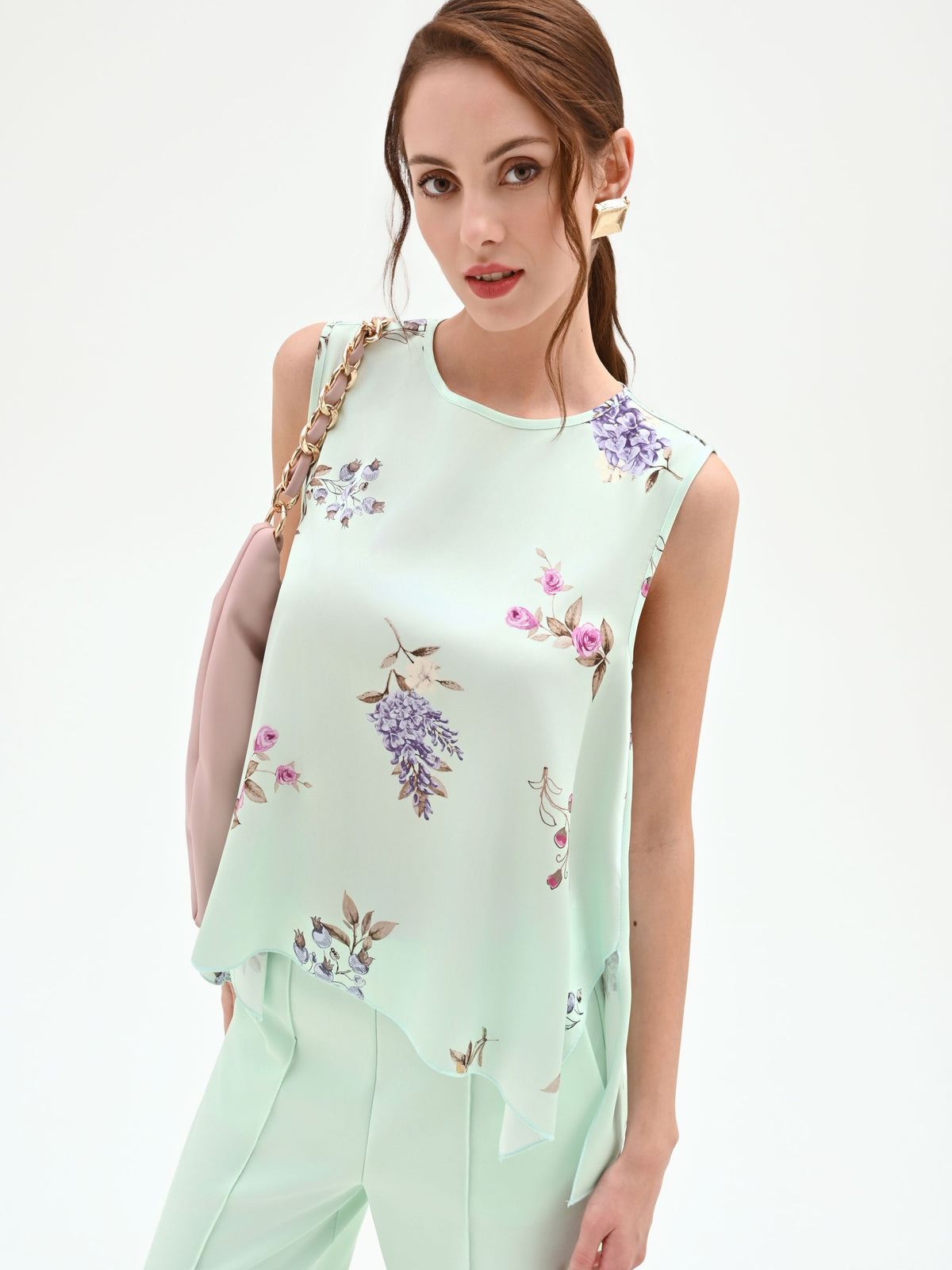 Top asimmetrico verde menta a stampa floreale