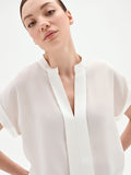 Blusa panna bianco in georgette con collo alla coreana