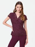 Top bordeaux in pizzo con scollo incrociato