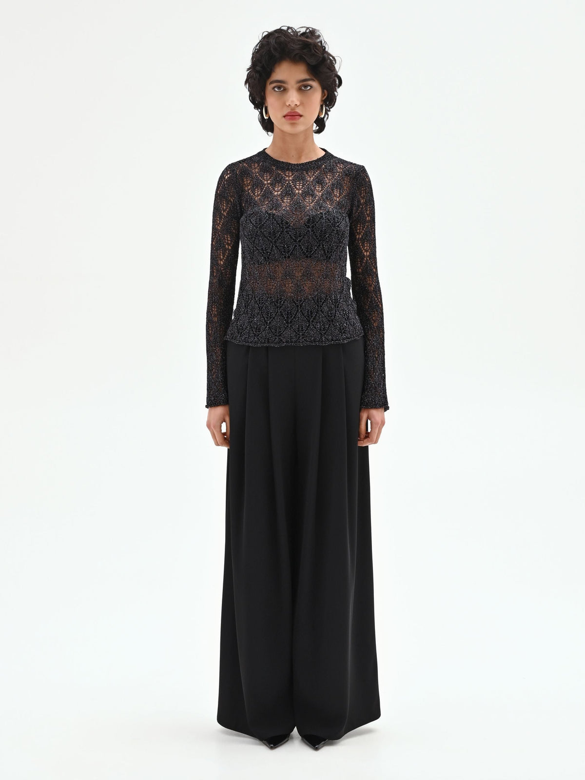 Maglia nera con lavorazione traforata e lurex