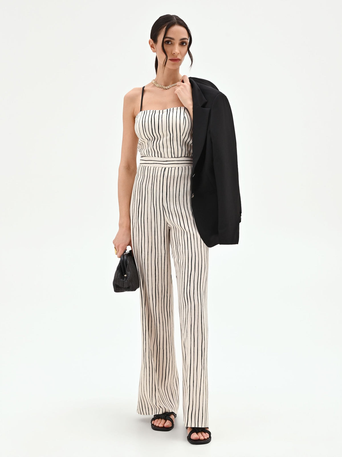 Pantalone in lino panna a palazzo con fantasia a righe