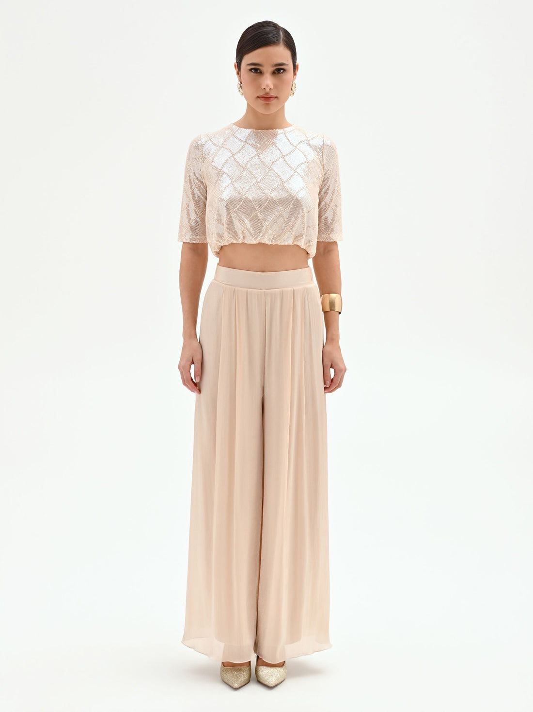 Pantalone a palazzo beige chiaro in raso cangiante
