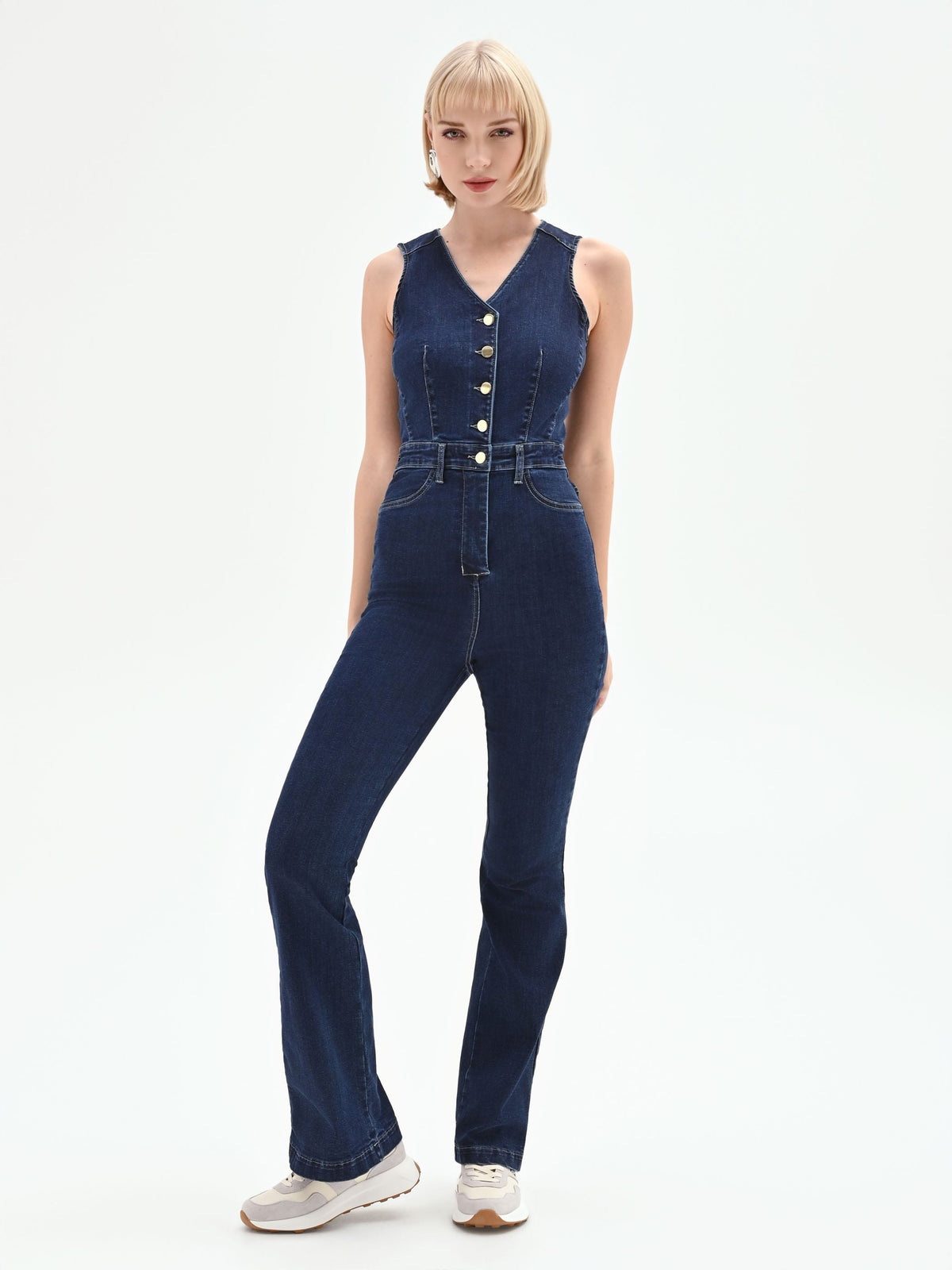 Tuta lunga in denim blu navy con bottoni a vista