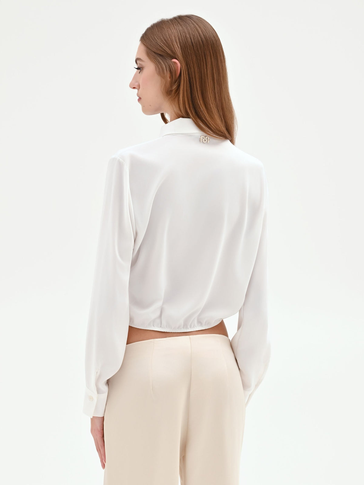Camicia cropped panna con fondo elastico