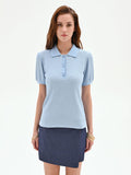 Polo azzurra in maglia a costine