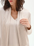 Blusa beige chiaro con foulard plissettato