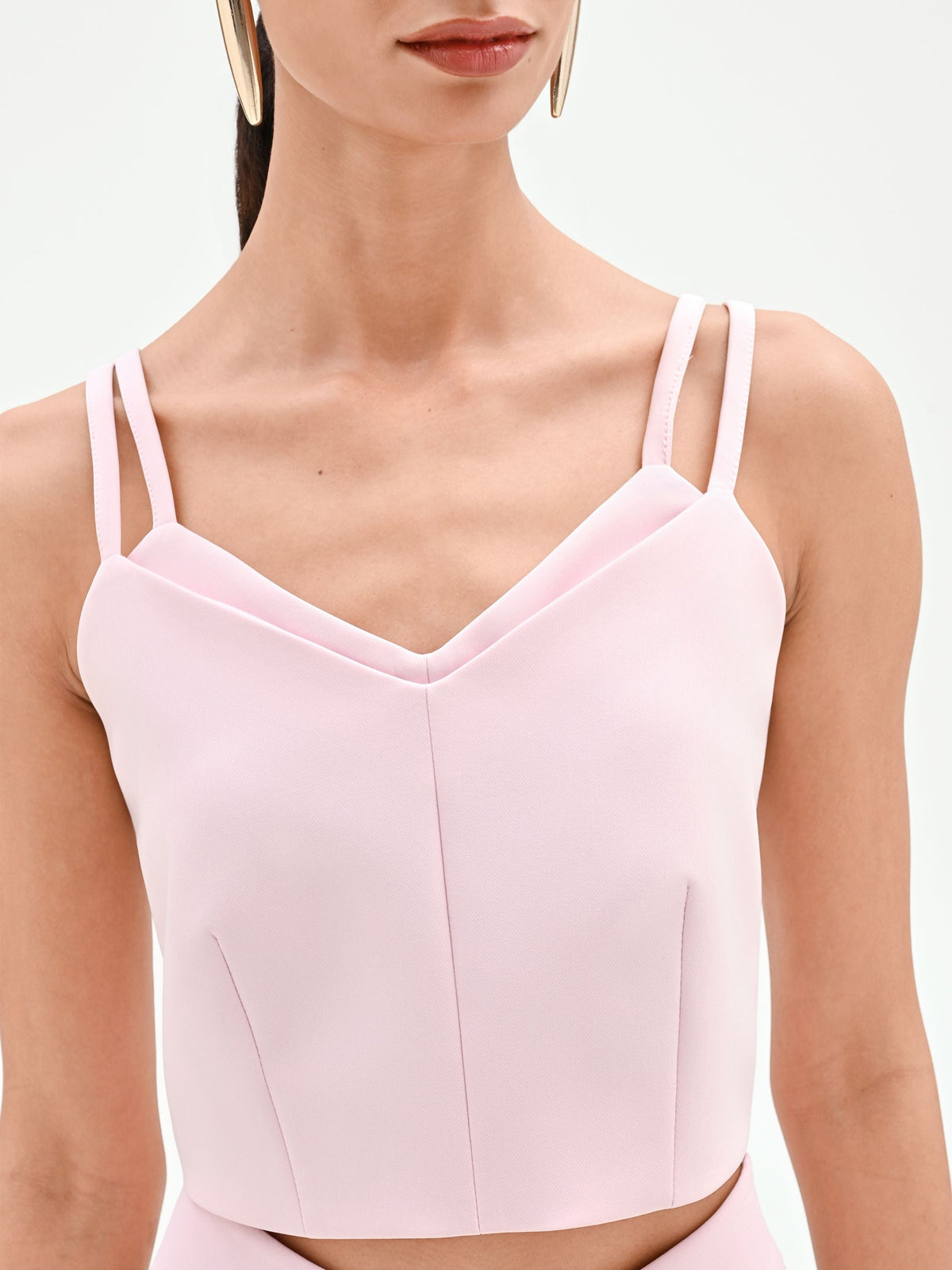 Top corto rosa pastello con doppie spalline