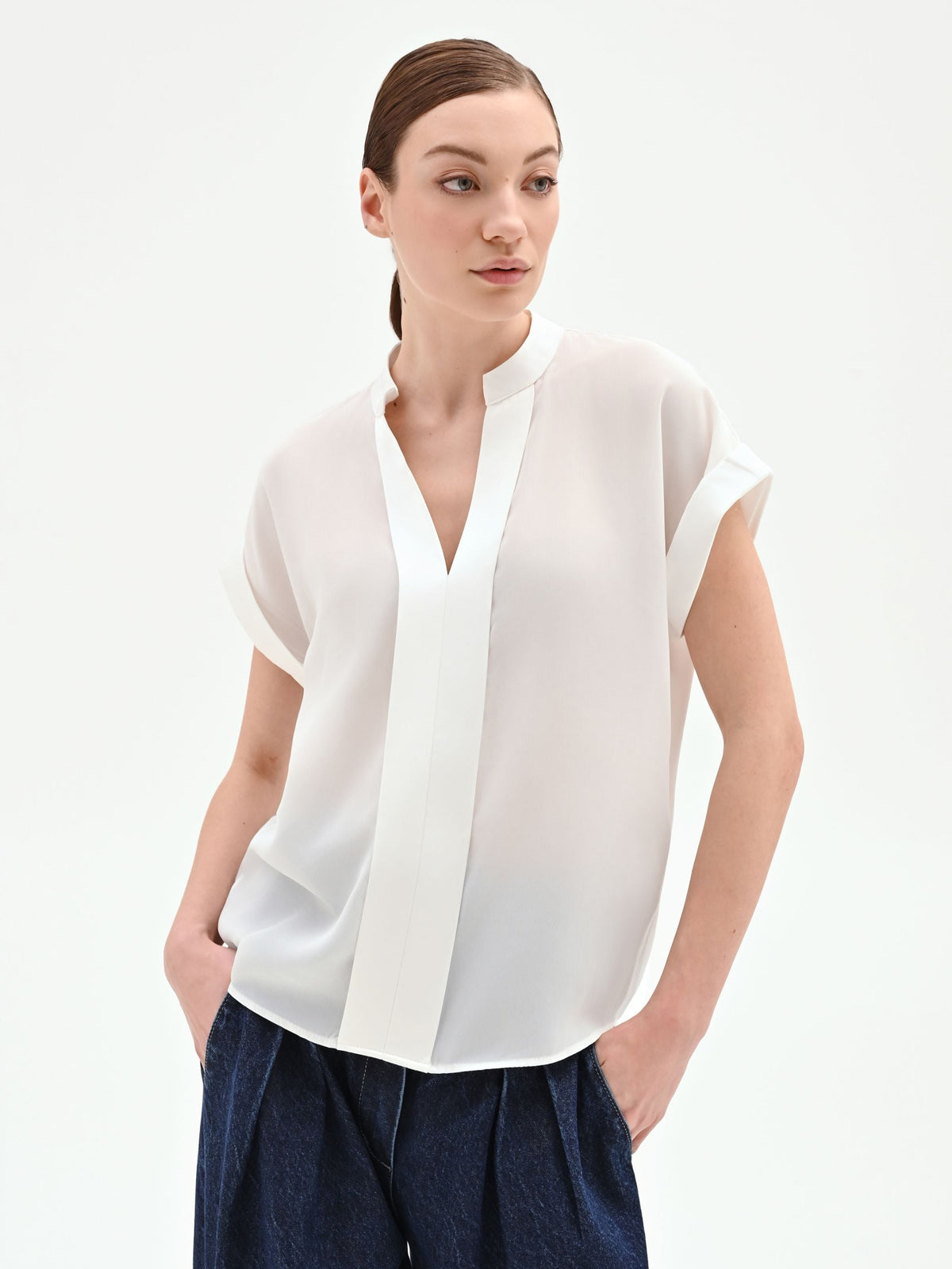 Blusa panna bianco in georgette con collo alla coreana