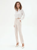 Pantaloni slim bianchi in tessuto fluido mano Crepe