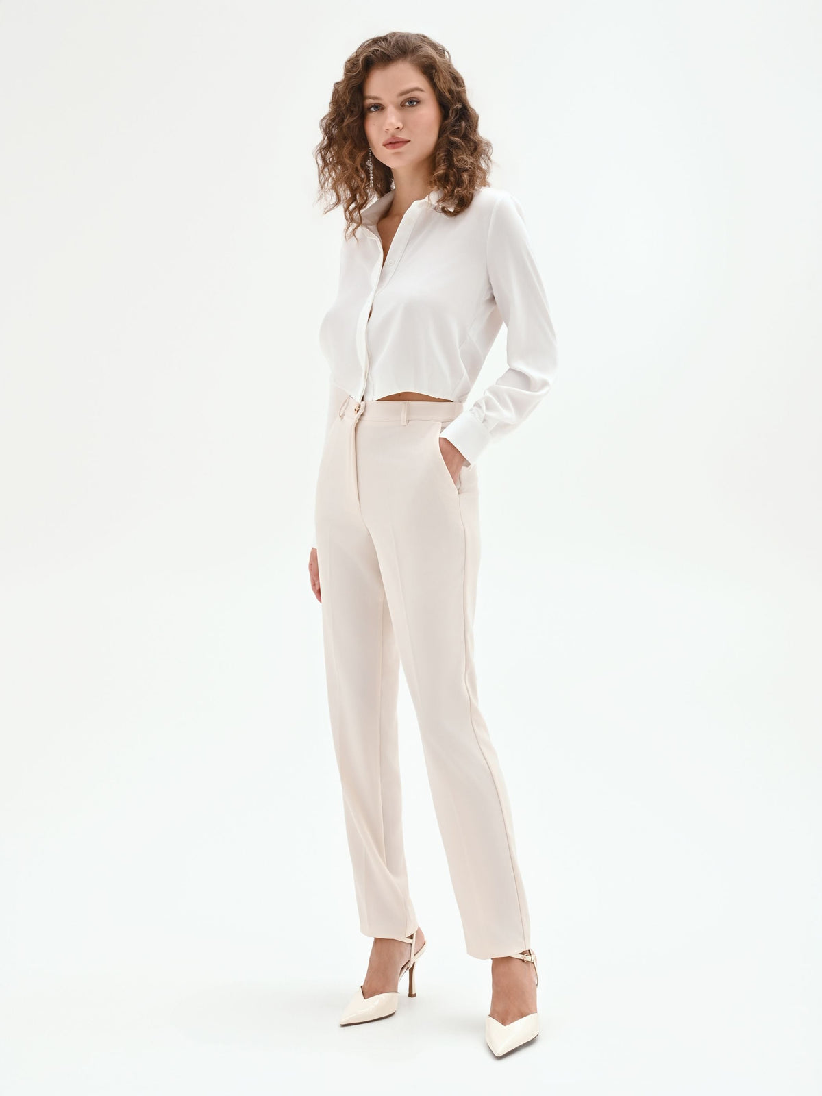 Pantaloni slim bianchi in tessuto fluido mano Crepe