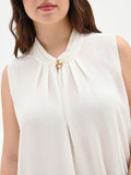 Top curvy  bianco panna con spilla gioiello
