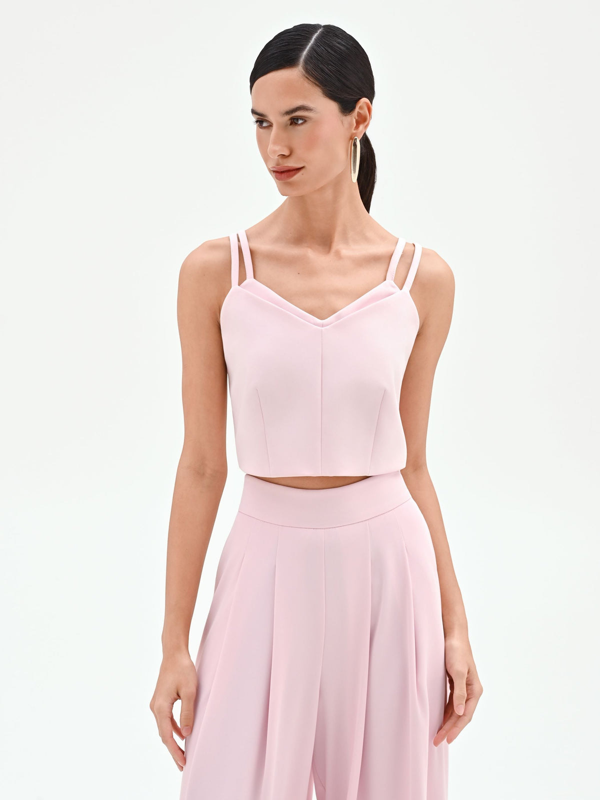 Top corto rosa pastello con doppie spalline