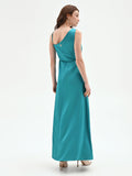 Abito lungo atelier verde smeraldo con drappeggio laterale