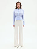 Camicia azzurra in cotone con pieghe cucite