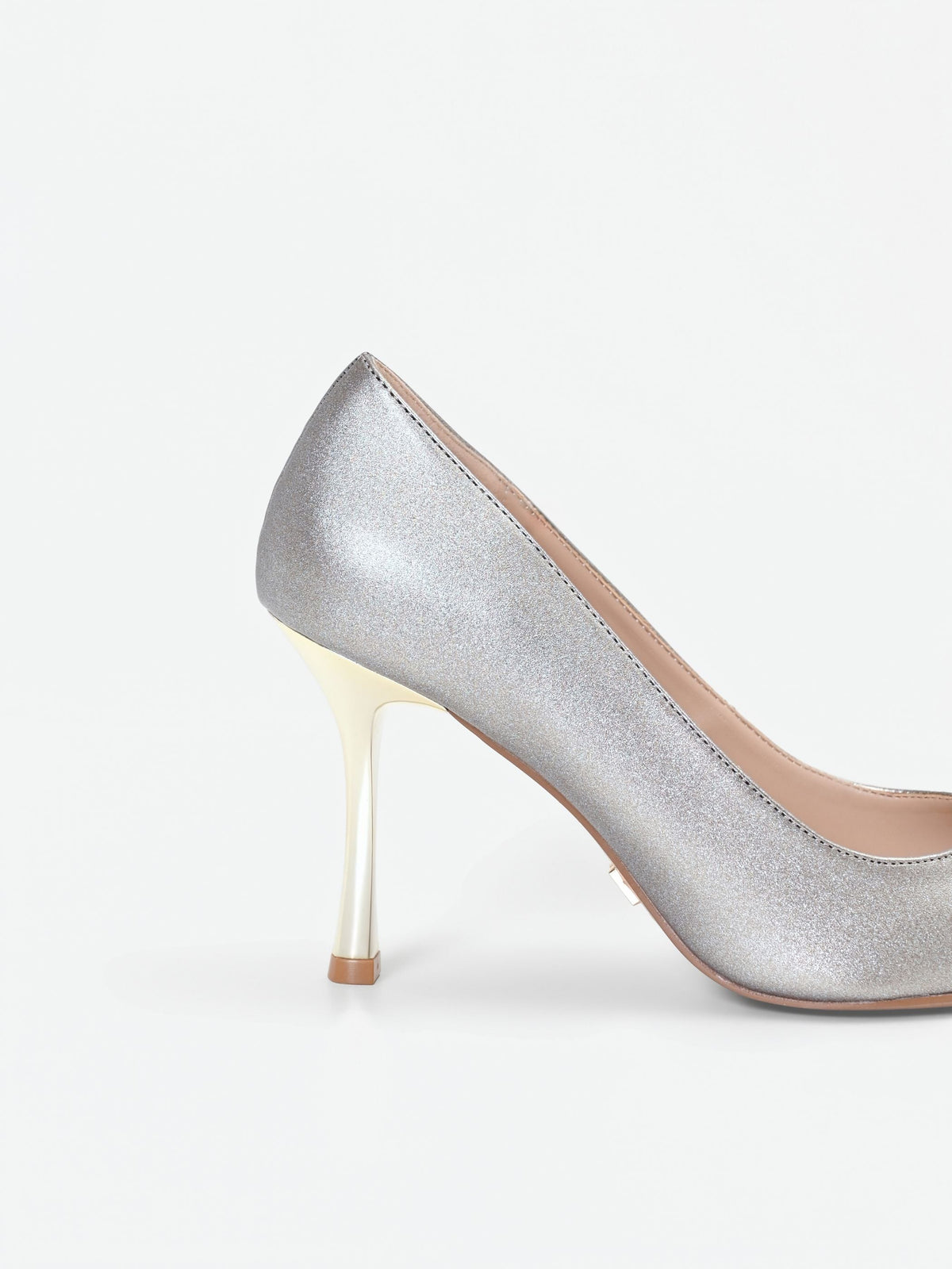 Décolleté argento glitterata con tacco cromato