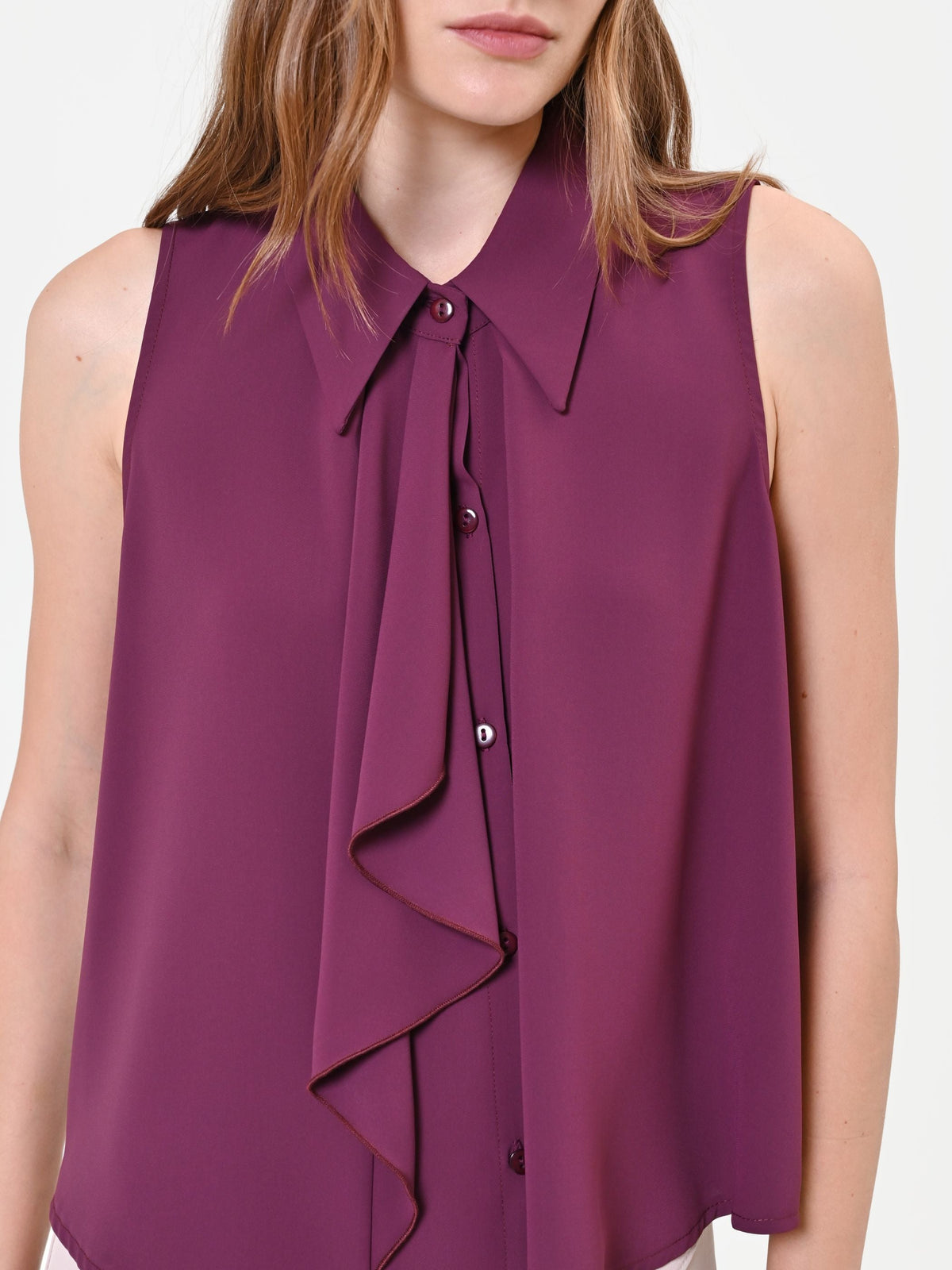 Top smanicato bordeaux con rouche verticale