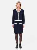 Gonna tubino in maglia blu navy con profili a contrasto