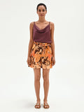 Pantaloncino arancione a fantasia tropicale