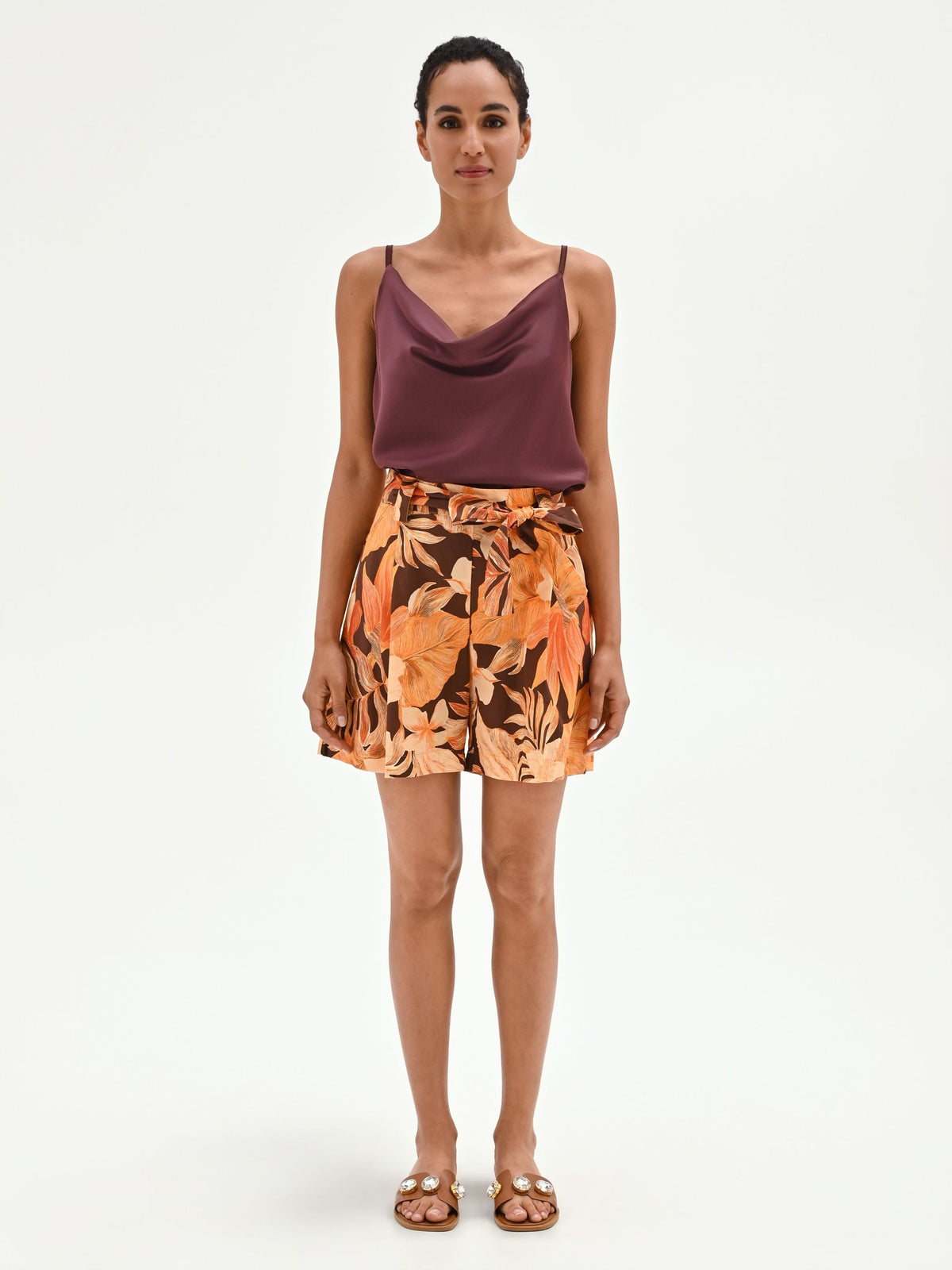 Pantaloncino arancione a fantasia tropicale