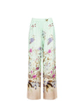 Pantalone palazzo verde menta in raso con stampa botanica