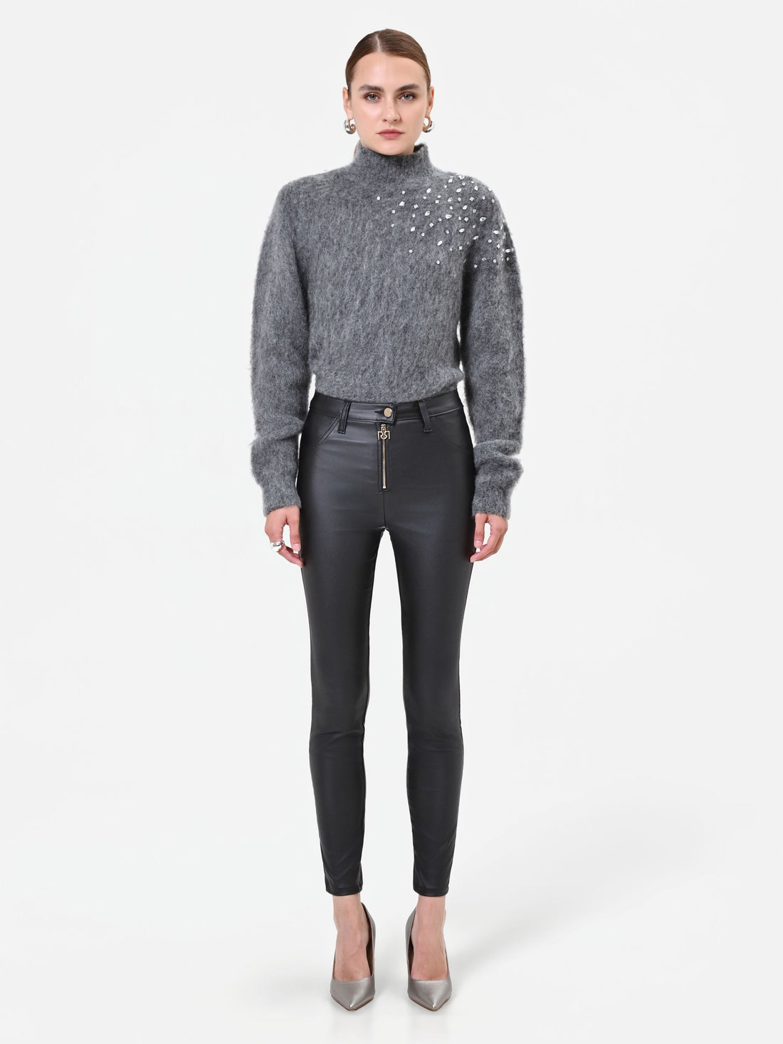 Leggings neri in similpelle con zip frontale