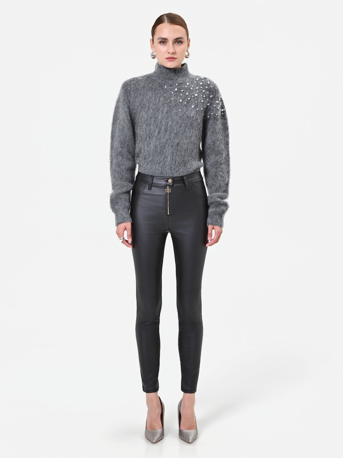 Leggings neri in similpelle con zip frontale