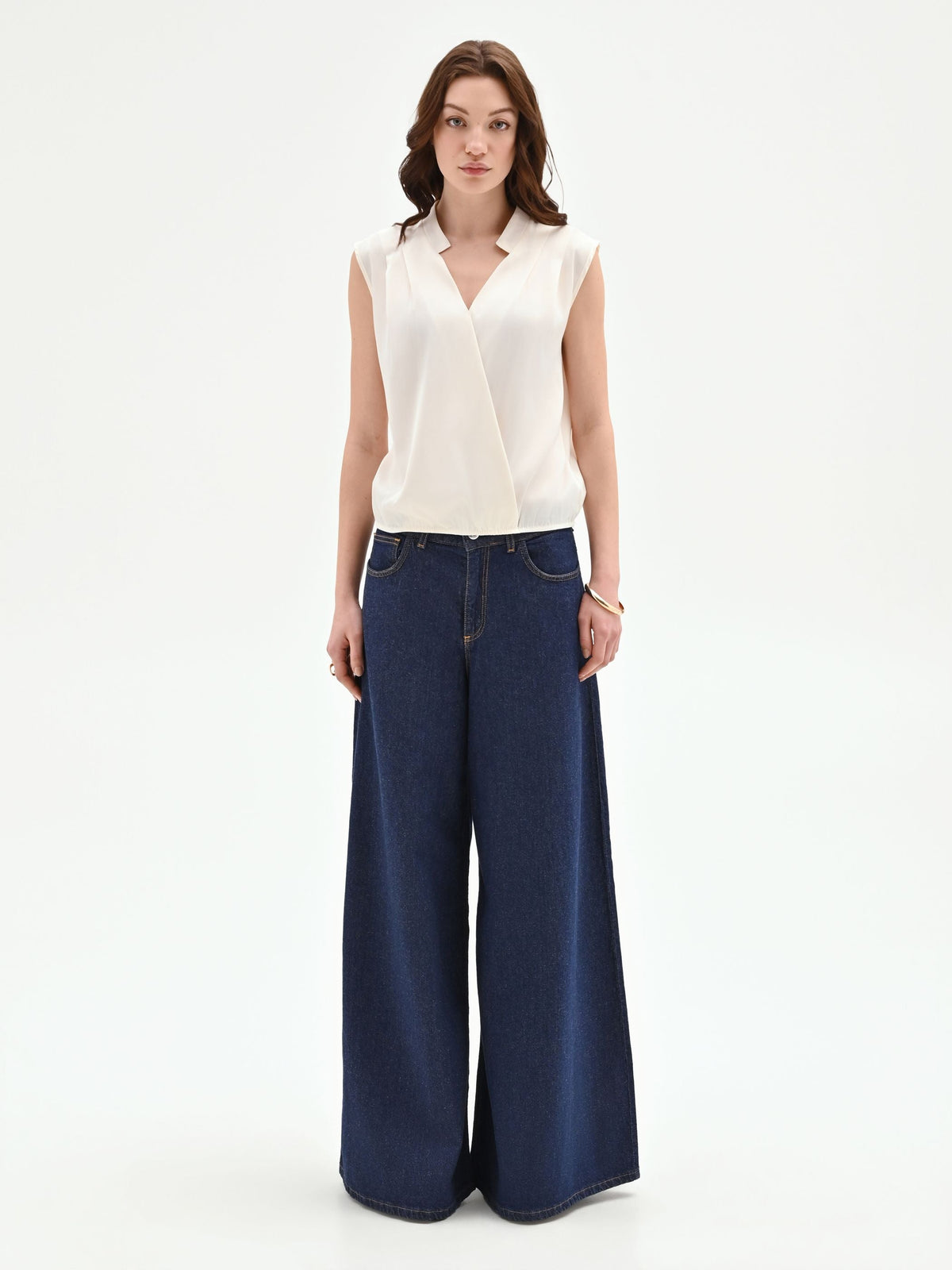 Top panna bianco in tweed stile gilet