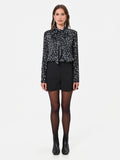 Blusa nera a pois con nastro lavallière