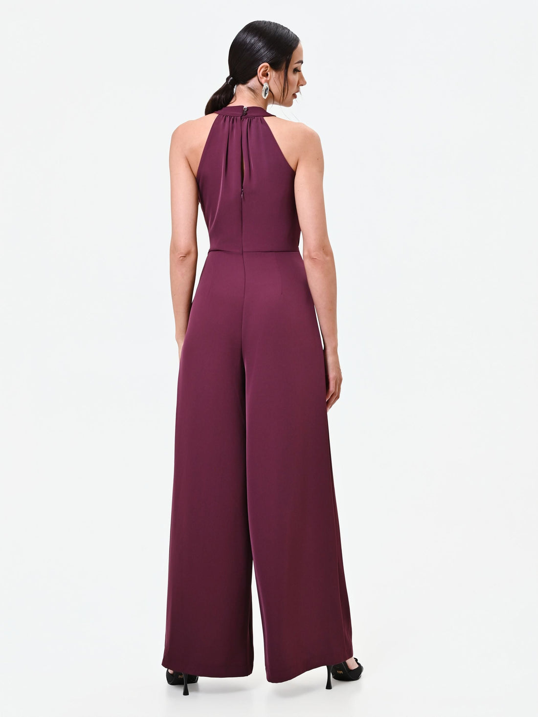 Tuta rosso bordeaux con pantalone palazzo