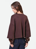 Felpa marrone con manica doppia in paillettes