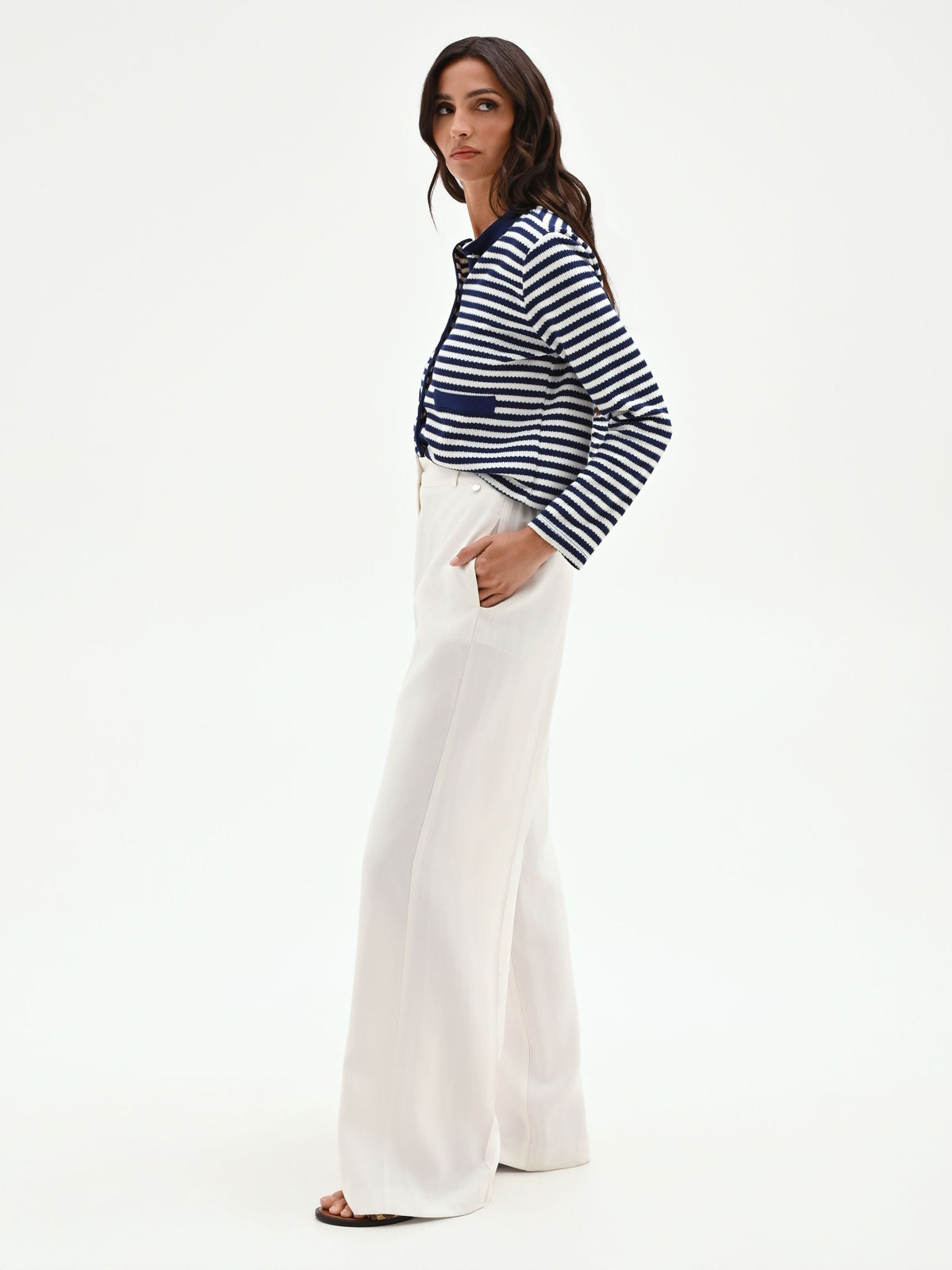 Pantalone a palazzo panna bianco con piega centrale