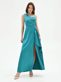 Abito lungo atelier verde smeraldo con drappeggio laterale