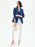 Jeans bianchi skinny con bottoni laterali