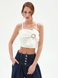 Top crop panna con maxi fiocco