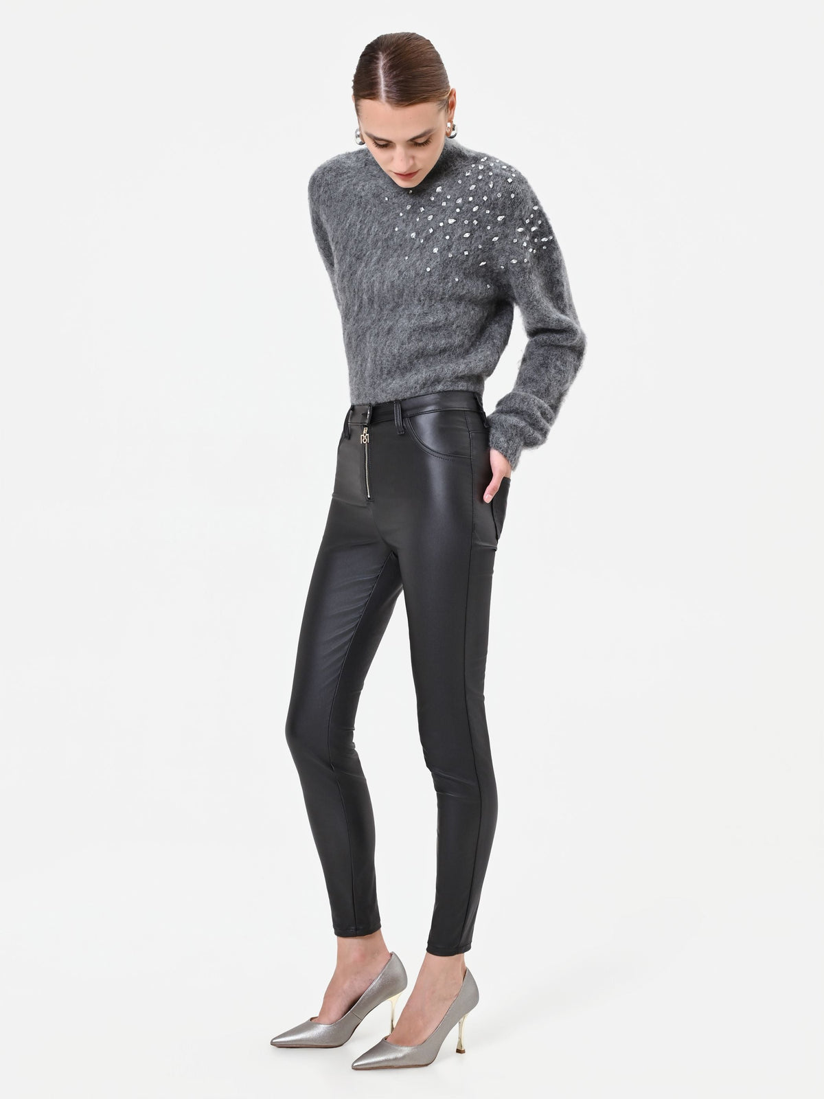 Leggings neri in similpelle con zip frontale