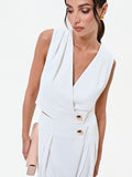 Gilet bianco cropped con bottone design