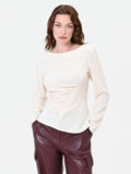 Blusa bianca con drappeggio asimmetrico