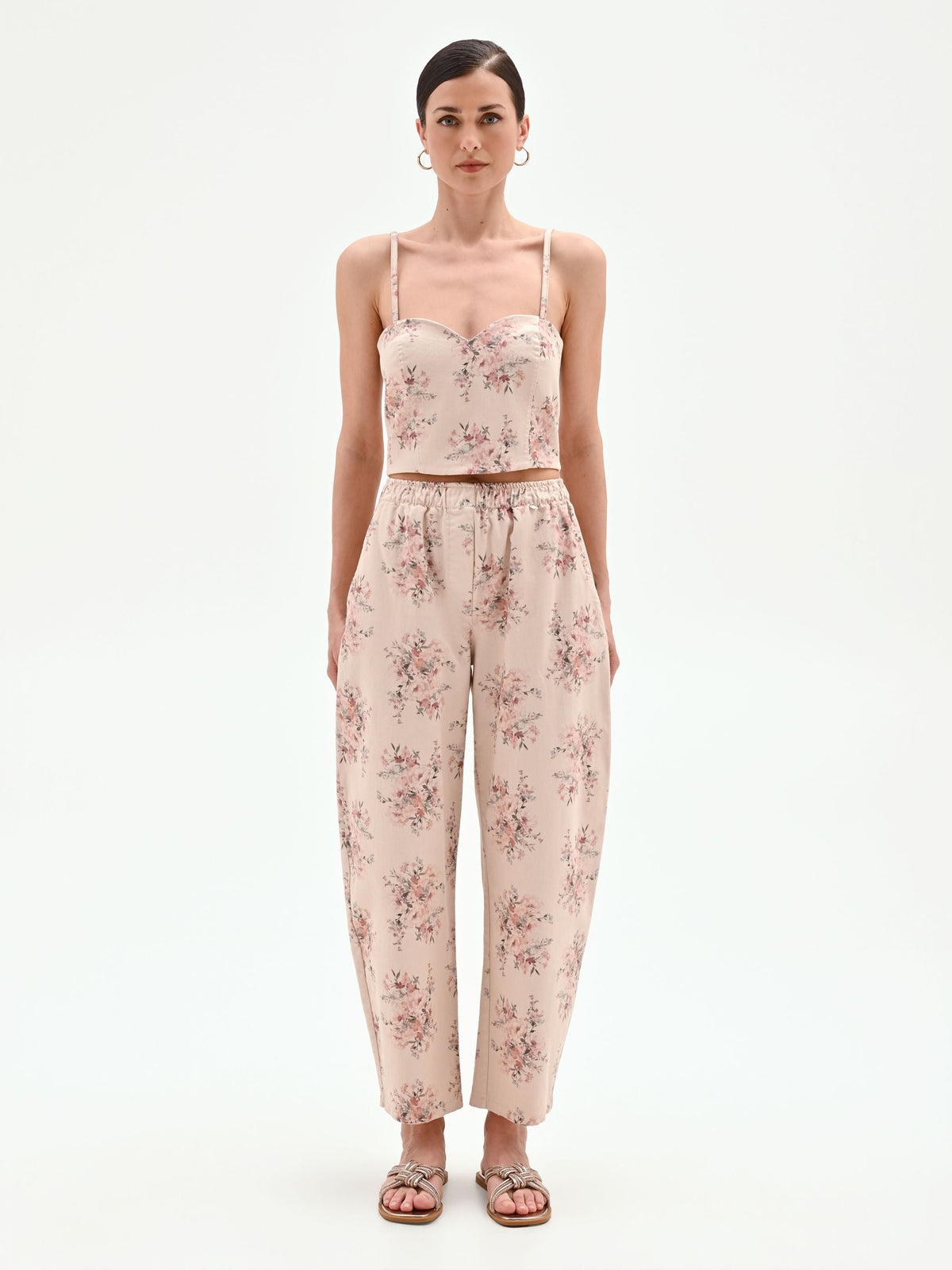 Pantalone rosa in denim stampa floreale