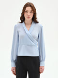 Blusa cielo azzurro con incrocio a portafoglio