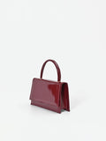 Borsa a mano bordeaux effetto vernice