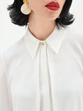 Camicia panna bianco dalla linea fluida