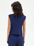 Gilet Studio blu indaco con chiusura asimmetrica