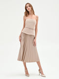 Abito tortora con top bustier e gonna plissé