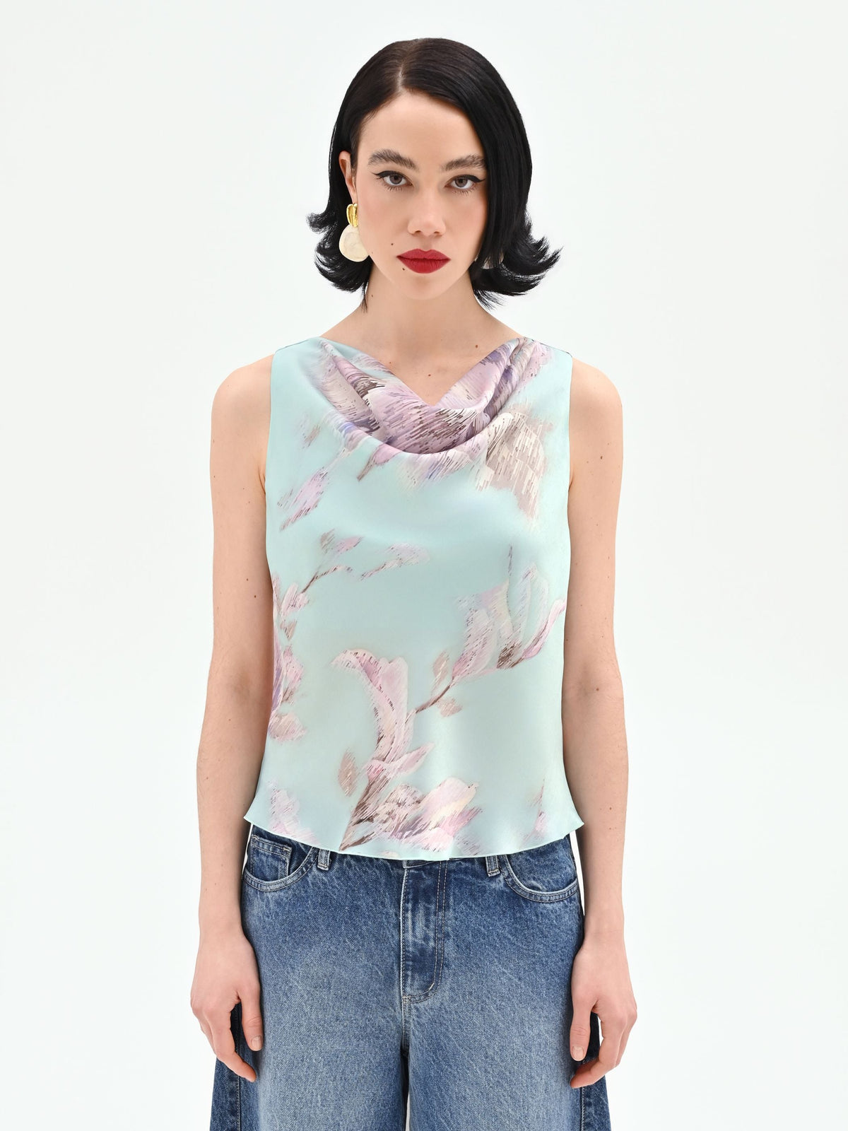 Top verde menta con stampa floreale jacquard