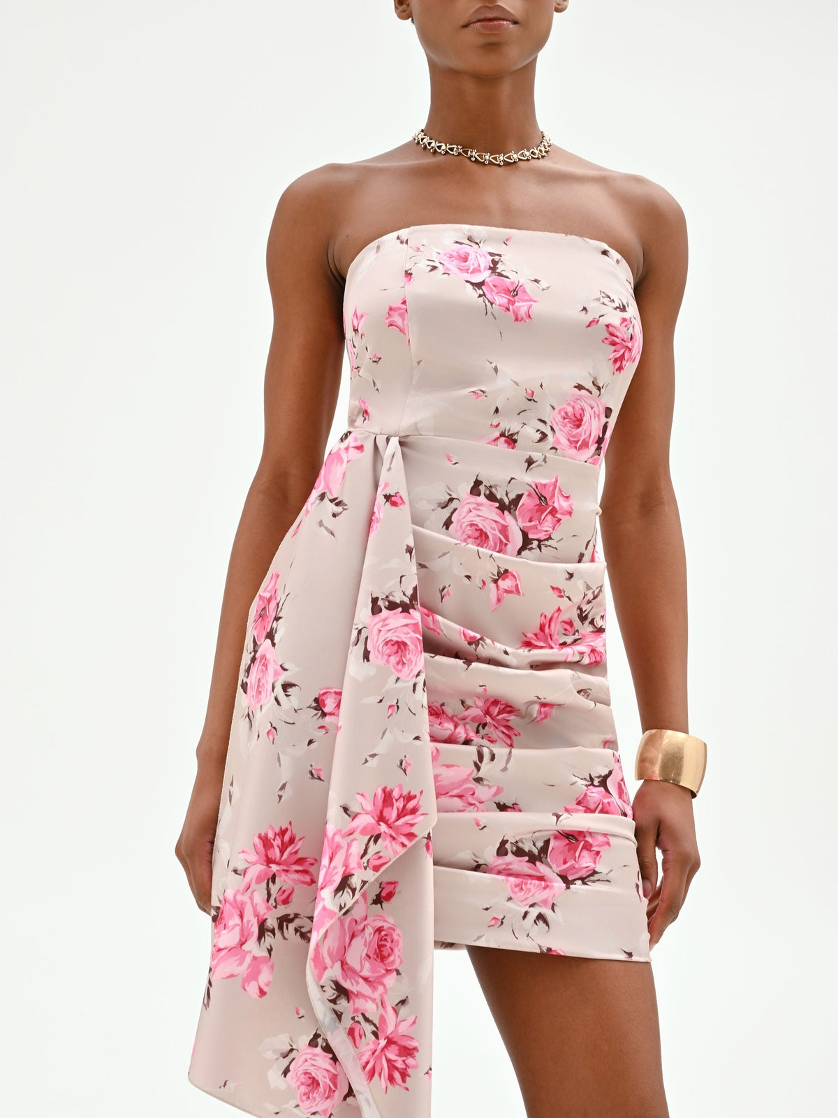 Mini abito rosa con stampa floreale e drappeggio