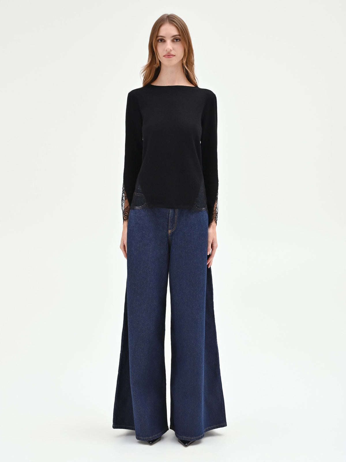 Maglia nera con inserti pizzo